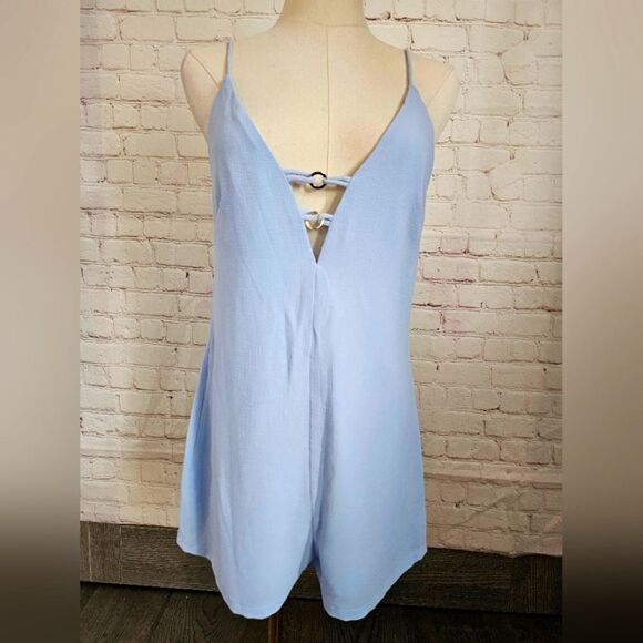 by the way. Pants - Revolve Kylan Double O Ring Romper | Light Blue | NWOT